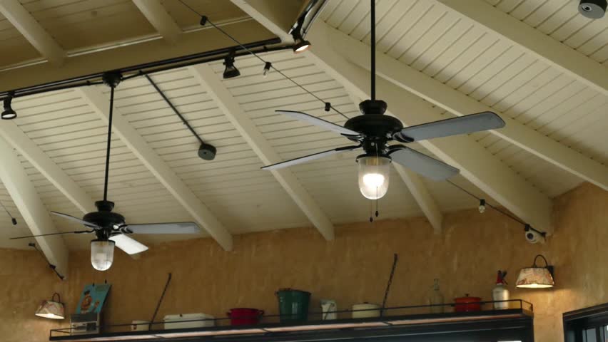 Vintage Ceiling Fan Rotates On In A Dark Room Stock Ceiling Fan Cooling The Crowed In Coffee Hd Stock Video Clip
