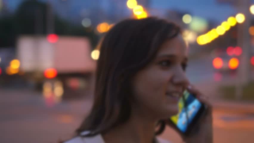 The Woman <b>Stand, Smile</b> And Phone By City Bokeh Background. - 5