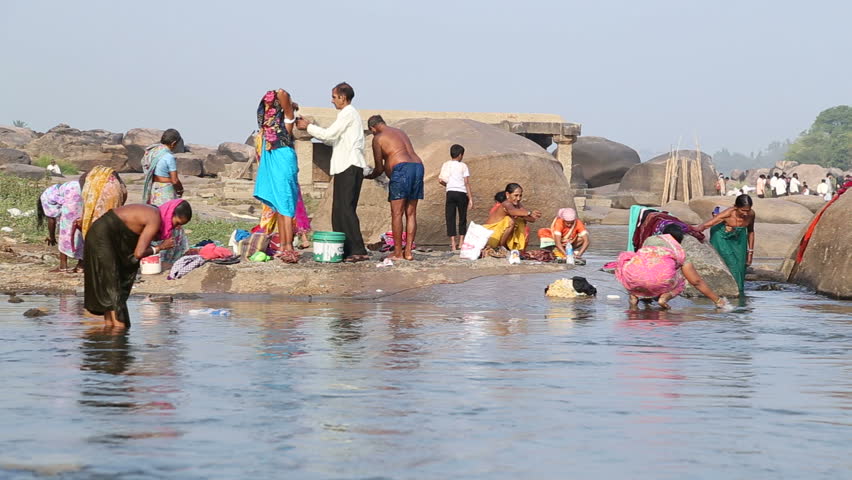 HAMPI INDIA 28 JANUARY 2015 People Having Bath On The Tungabhadra