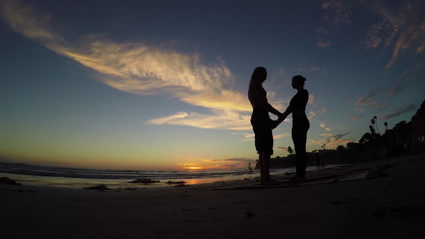 Couple Walking Along Summer Beach At Sunset Stock Footage Video 2526950