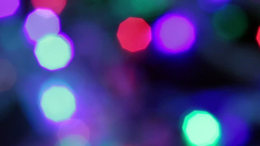 blurred colorful christmas lights on black background with blurred colorful christmas lights on black background with