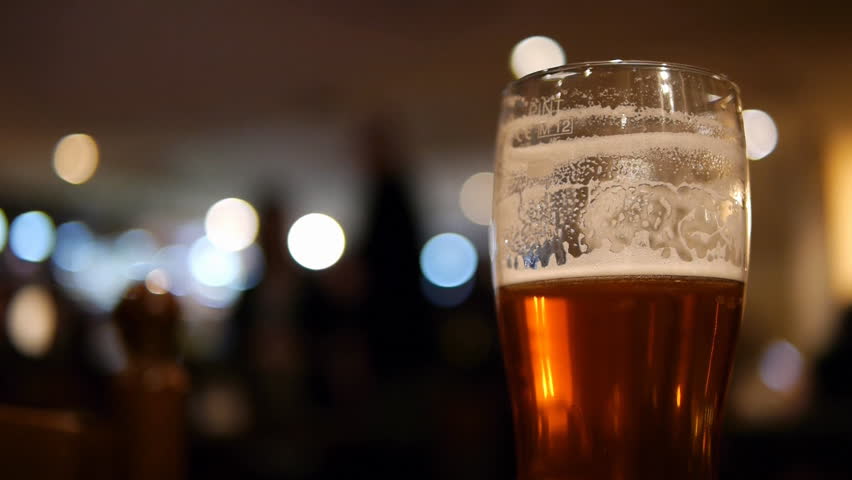 Download Beer Glass In A Pub. Half Drunk Glass Of Beer With An Out ... Yellowimages Mockups