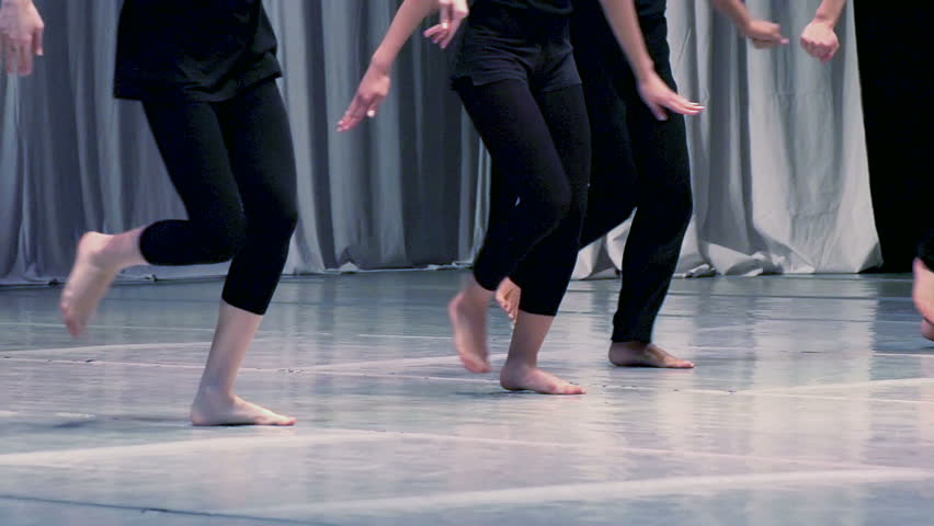 Contemporary Choreography Men And Women Dressed In Black Dancing