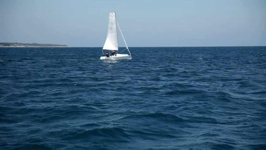 Sailing Boat Navigating With Open Sails In The Sea Stock Footage Video 