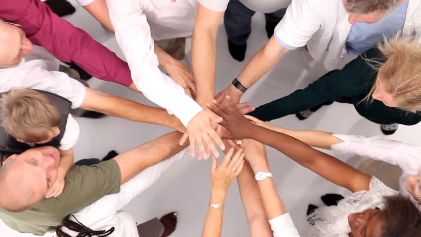 group-of-people-coming-together-and-joining-hands-to-form-a-happy-close