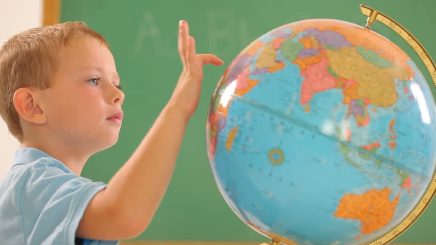 Togolese Boy Looking At Globe In School Boy In Classroom Looking At Globe Stock Footage