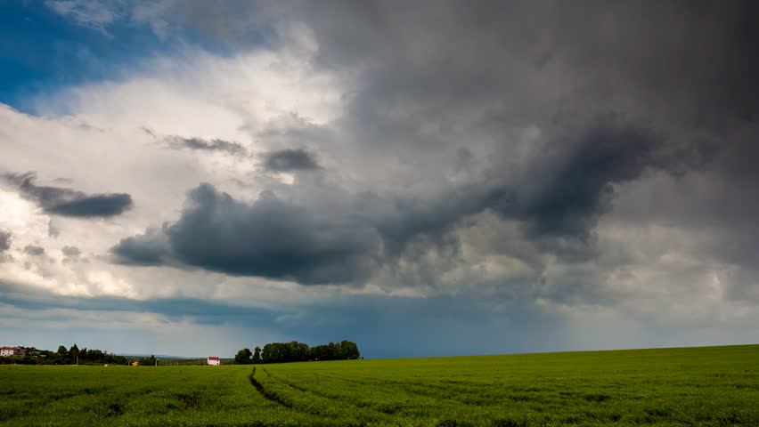 time-lapse-clip-hd-video-high-definition-field-with-overcast-sky