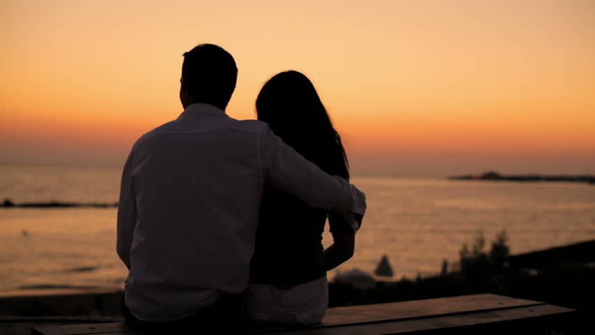 Couple Sitting Together At Beach And Talking Stock Footage Video 7244038 Shutterstock 6338