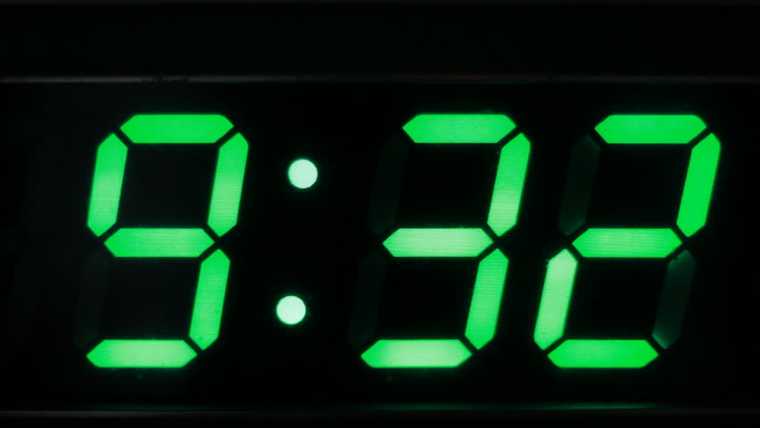 digital-clock-showing-the-time-9-33-pm-stock-footage-video-6042323