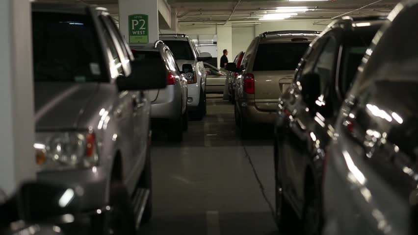 Cars Driving In A Busy Parking Garage In A City Mall Stock Footage 