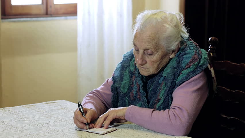 Describe the physical appearance of the old woman image