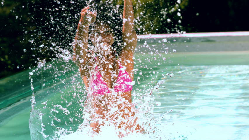 Happy Woman In Pink Bikini Emerging In Swimming Pool In Slow Motion