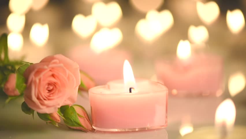 Candles Light Background. Heart Shaped Valentine’s Day Candle Flame At