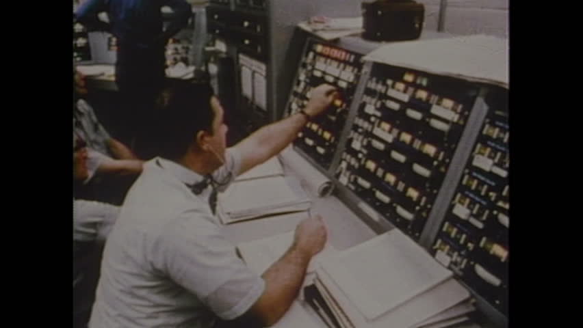 UNITED STATES 1970s: Astronaut In Training Facility / Men In Control ...