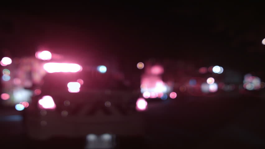 Shot Of Blurred Police Lights On Top Of A Patrol Car At Night DV NTSC ...