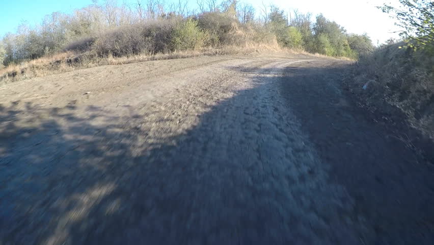 Dirt Road In Field And City In Distance. Aerial View Stock Footage ...