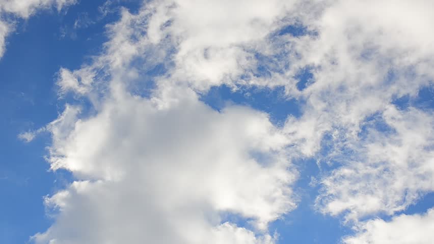 4K TIme Lapse Close Up Scene Above White Puffy Clouds And Blue Sky ...