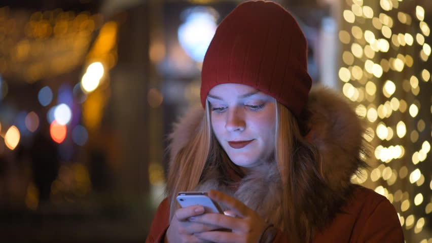 Girl Using A Cell Phone Outdoors At Night. Stock Footage Video 13697972 ...