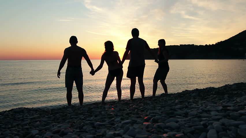 Group Of People Dancing On The Beach At Sunset, Group Of Happy Young ...