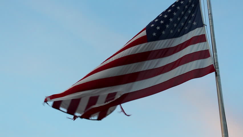 A Torn And Tattered American Flag Waves In The Wind Stock Footage Video ...