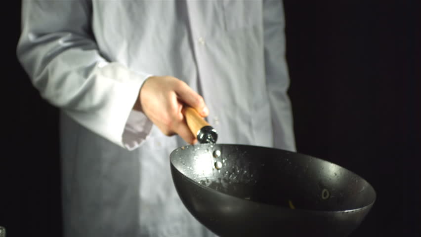 Chef Tossing Vegetable Stir Fry In A Wok In Slow Motion Stock Footage ...