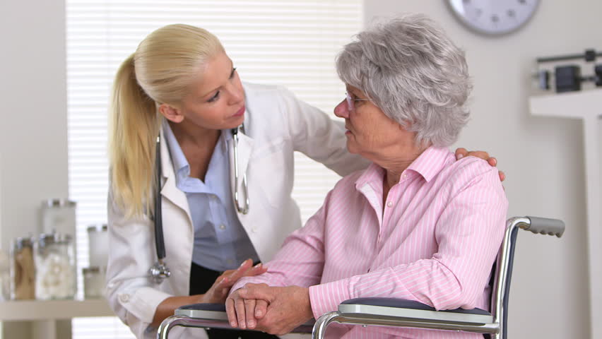 Female Doctor Talking To Patient In Wheelchair Stock Footage Video ...