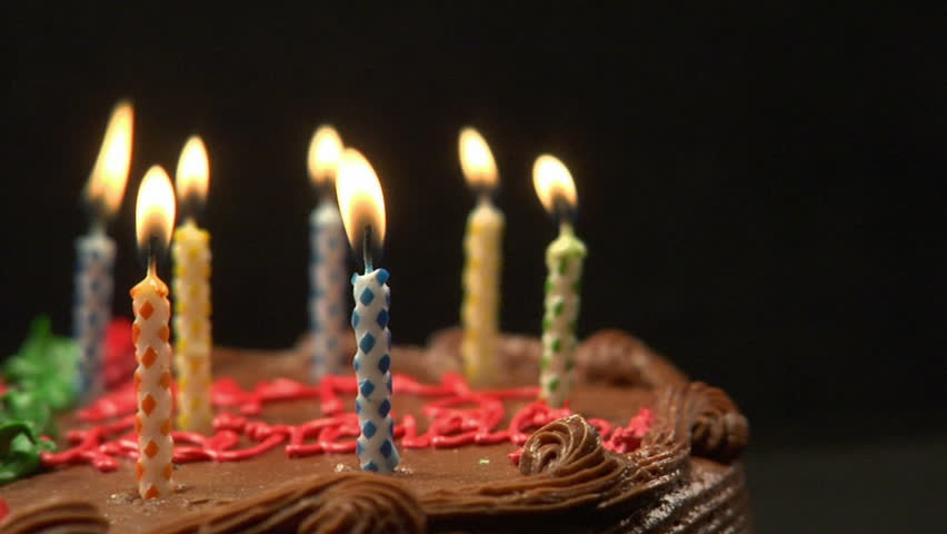 Birthday Candles Being Blown Out On A Delicious Cake Close Up In Slow ...