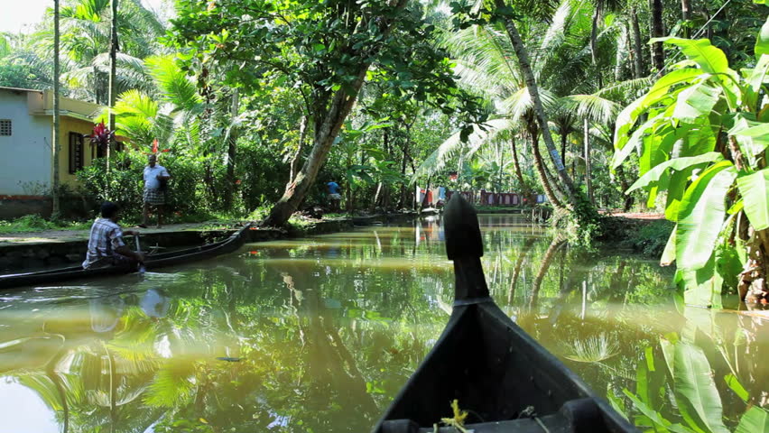 India - January 2011: Traveling POV In A Traditional Canoe Through ...