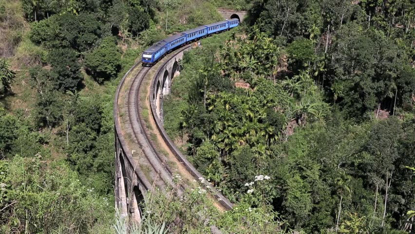 Train Exits Tunnel And Crosses Bridge Stock Footage Video 4902602 ...