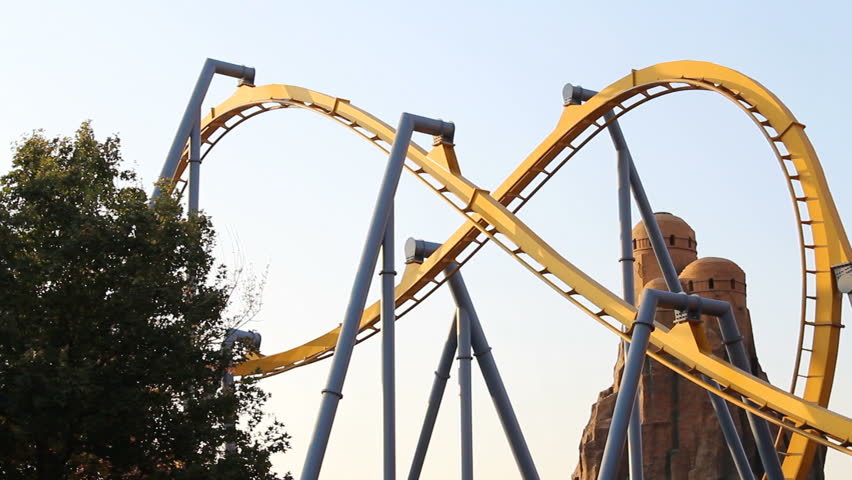 BEIJING, CHINA OCT 25, 2013: People Riding Roller Coaster At Beijing ...