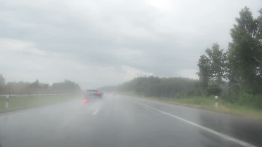 Cars Going On Wet Highway Road In Heavy Rain Water Fall. Dangerous ...