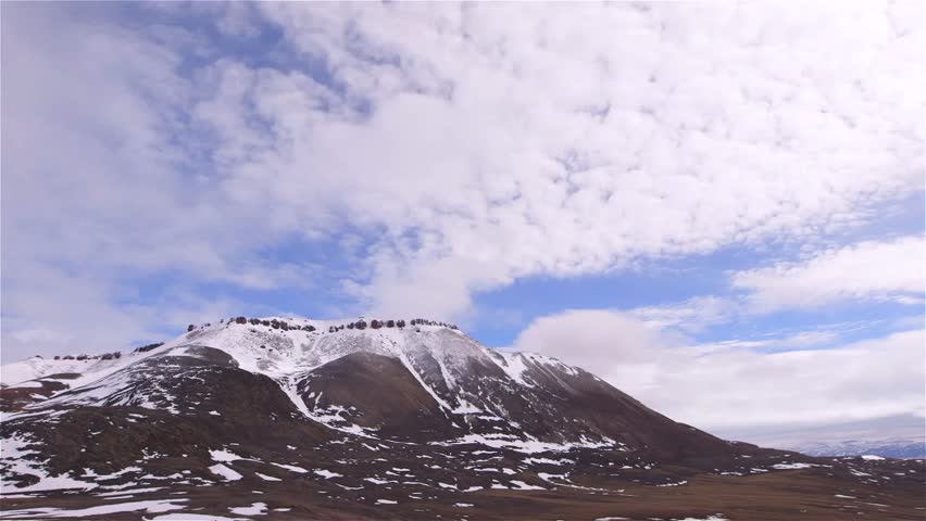 Clouds Quickly Moving Over The Top Of Mountains Near Arctic Bay ...