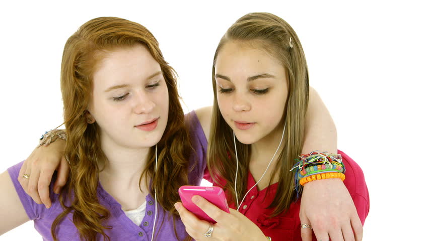 Two Pretty Teenage Girls Who Are Best Friends Sharing Listening To ...