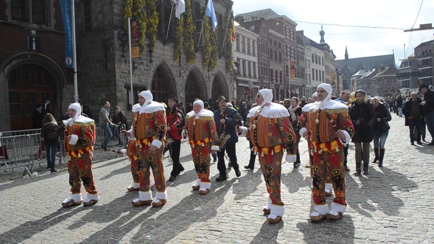 BINCHE, BELGIUM, 4 MARCH, 2014: People In Traditional Costumes Are ...