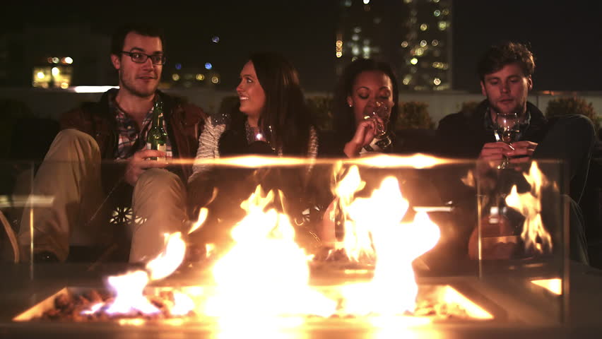 Image result for relaxing around bonfire during daytime images