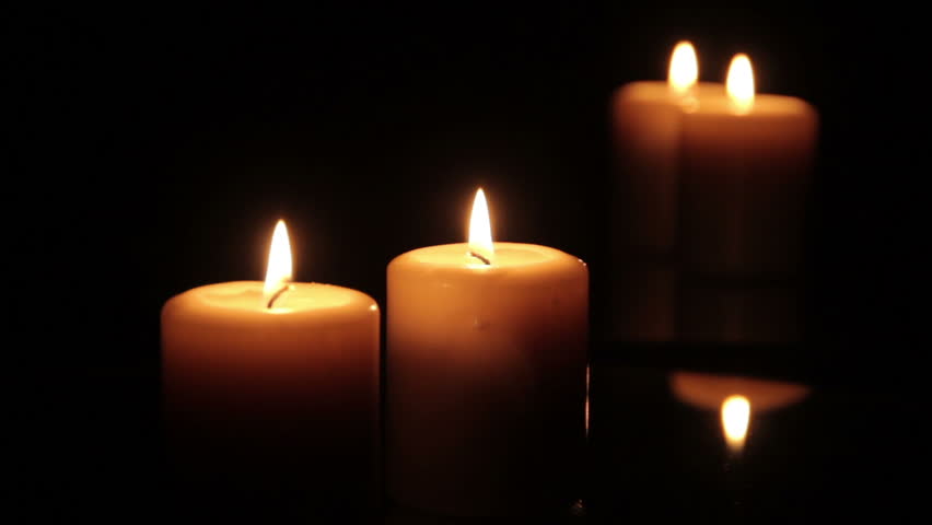 Two Candles Burning In Front Of A Mirror Stock Footage Video 7035604 ...