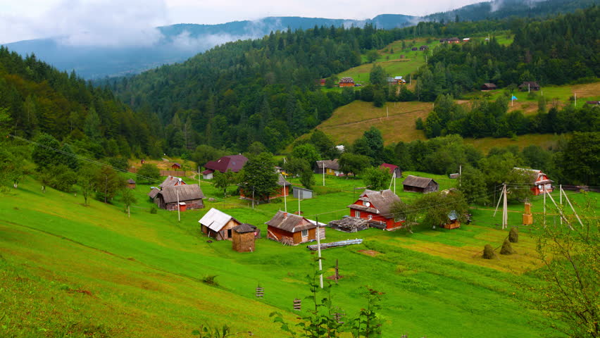 Mountain Village In A Forest And Cloudy Sky. 4K. FULL HD, 4096x2304 ...