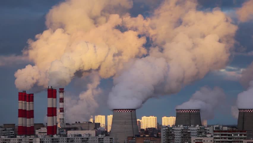 Smoke Pollution From Power Plant Smokestacks Over Urban Cityscape At ...