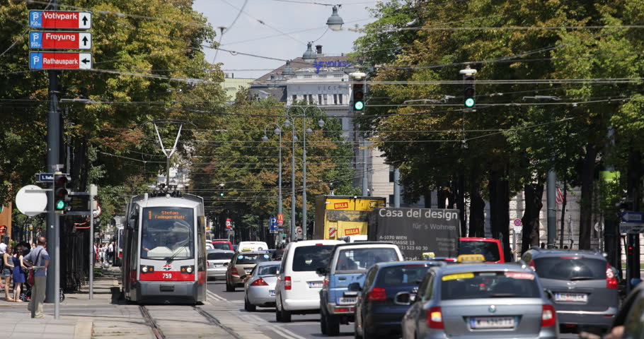 VIENNA, AUSTRIA - SEPTEMBER 15, 2014 Modern Tram Pass Vienna Cars ...